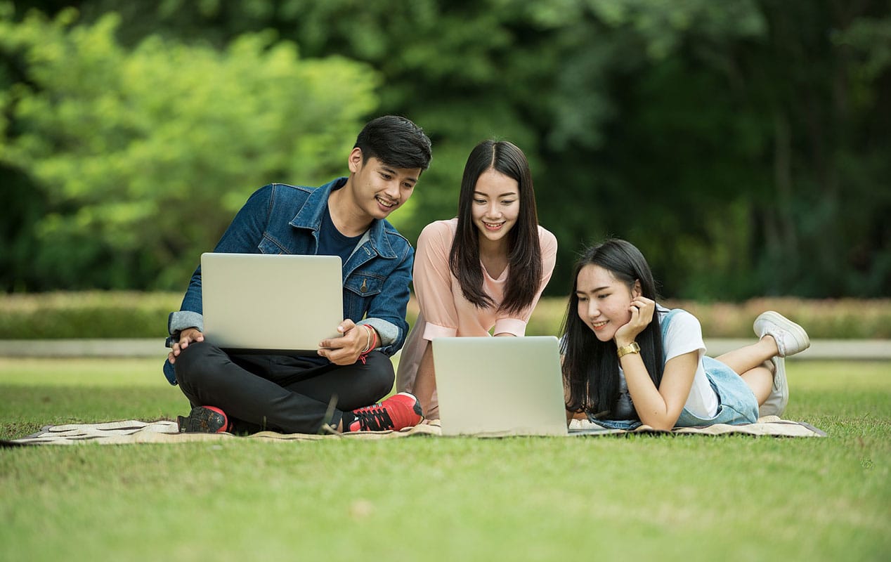 Students On Computers Outside